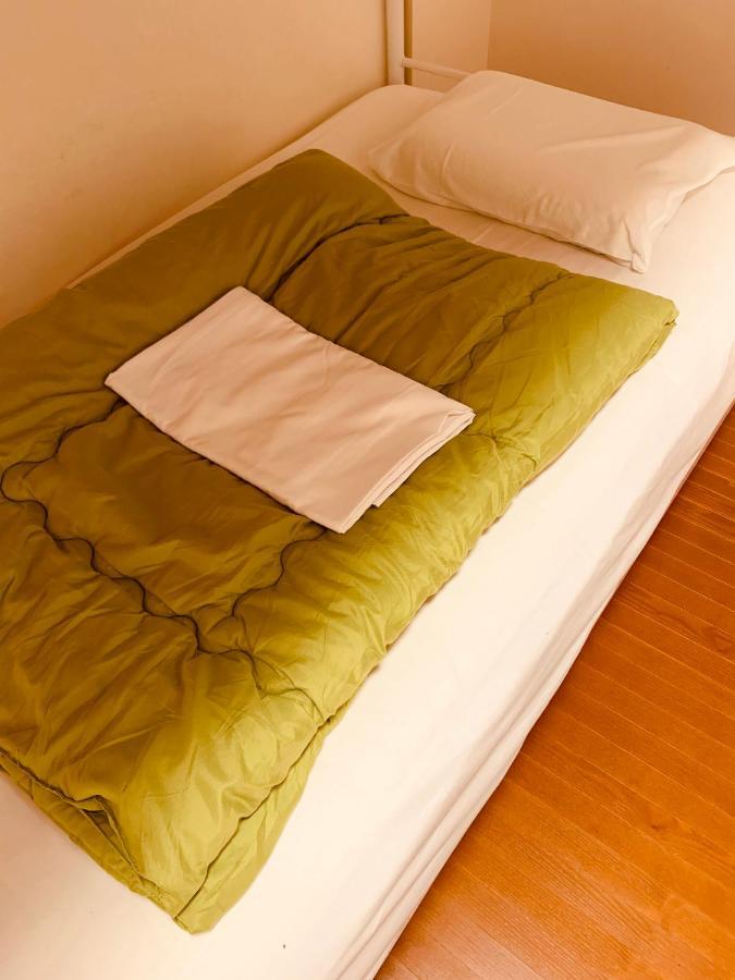 Guesthouse Shiawase Eki Fukuoka  Exterior photo
