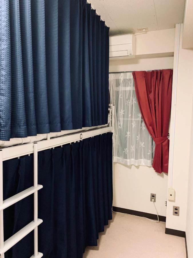 Guesthouse Shiawase Eki Fukuoka  Exterior photo